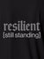 Close up of 'Resilient' design on Men's Dark Grey Polo T-shirt, highlighting intricate details and vibrant print.
