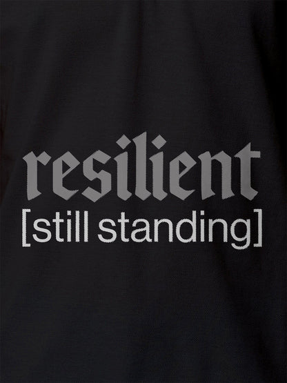 Close up of 'Resilient' design on Women's Dark Grey Polo T-shirt, highlighting intricate details and vibrant print.