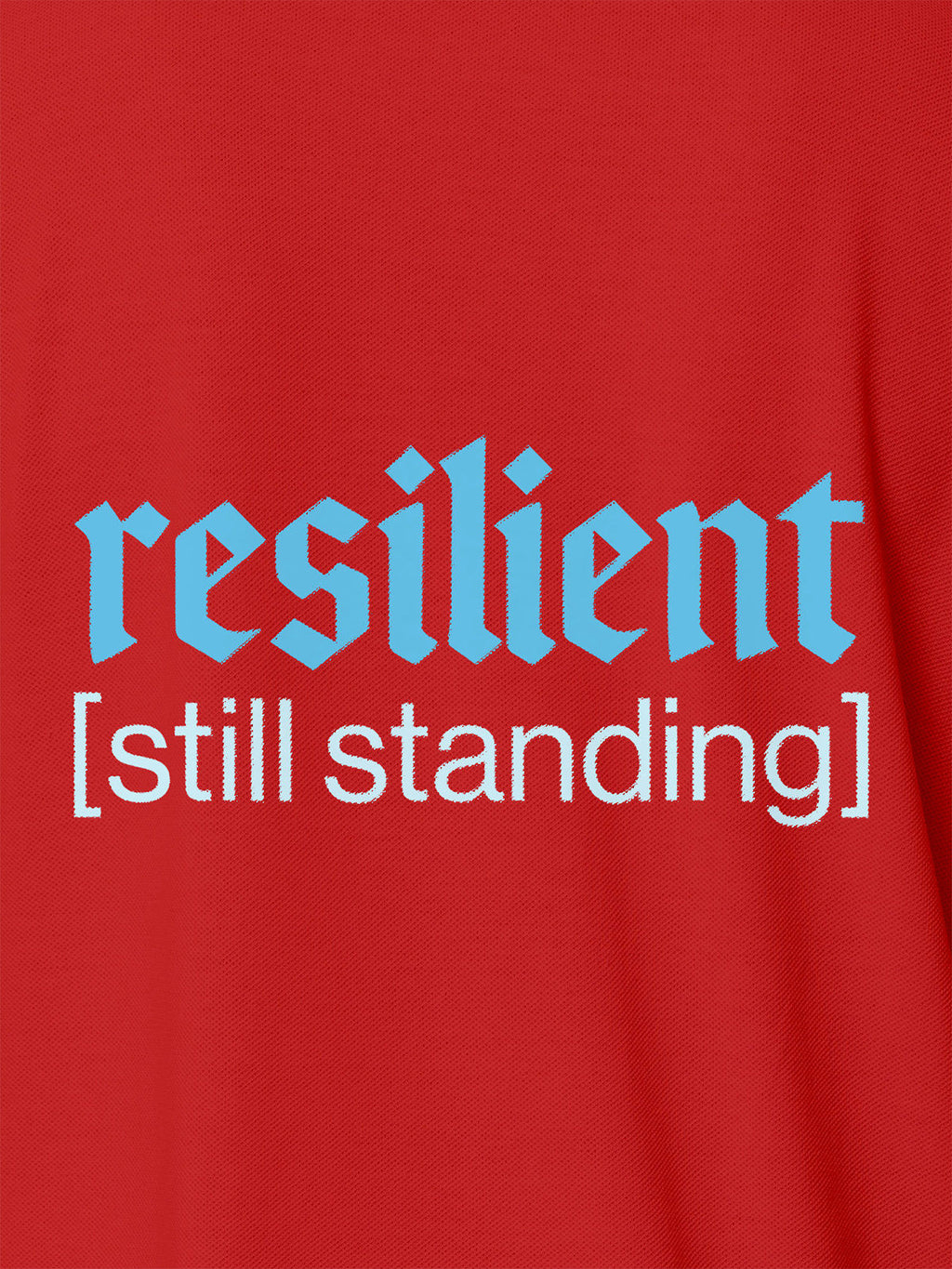 Close up of 'Resilient' design on Men's Red Polo T-shirt, highlighting intricate details and vibrant print.