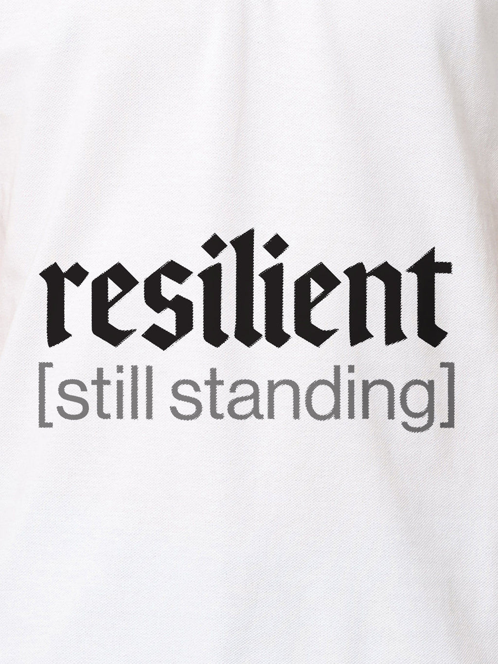 Close up of 'Resilient' design on Women's White Polo T-shirt, highlighting intricate details and vibrant print.