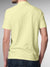 Back view of Fighterhero Men's Yellow Polo T-shirt with 'Resilient' design, highlighting the modern look and clean finish
