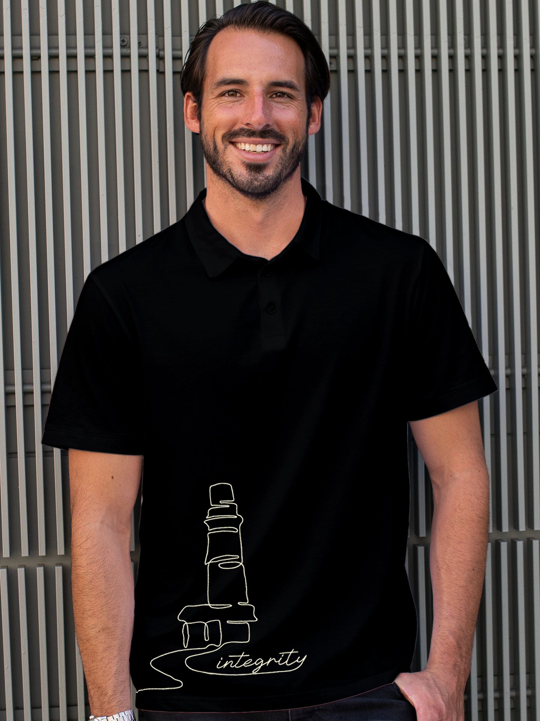 Model wearing Men's Black Polo T-shirt with 'Integrity' design, offering effortless style and premium comfort