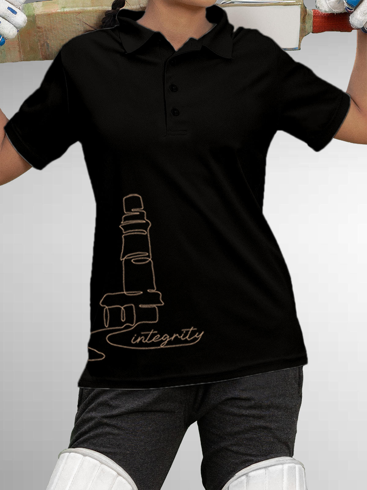 Model wearing Women's Black Polo T-shirt with 'Integrity' design, offering effortless style and premium comfort