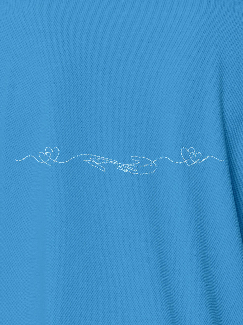 Close up of 'Empathy' design on Men's Blue Polo T-shirt, highlighting intricate details and vibrant print.