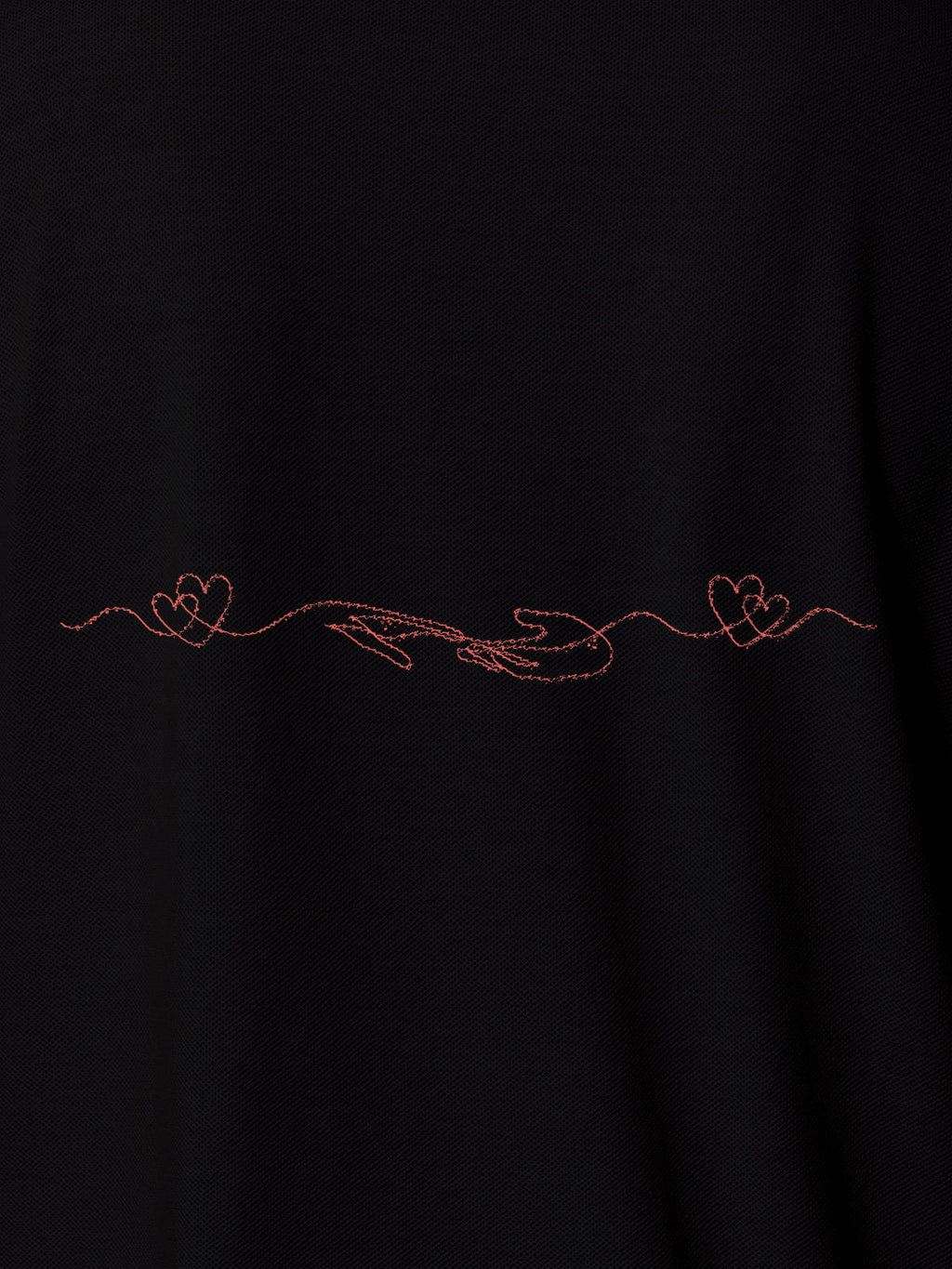 Close up of 'Empathy' design on Men's Black Polo T-shirt, highlighting intricate details and vibrant print.