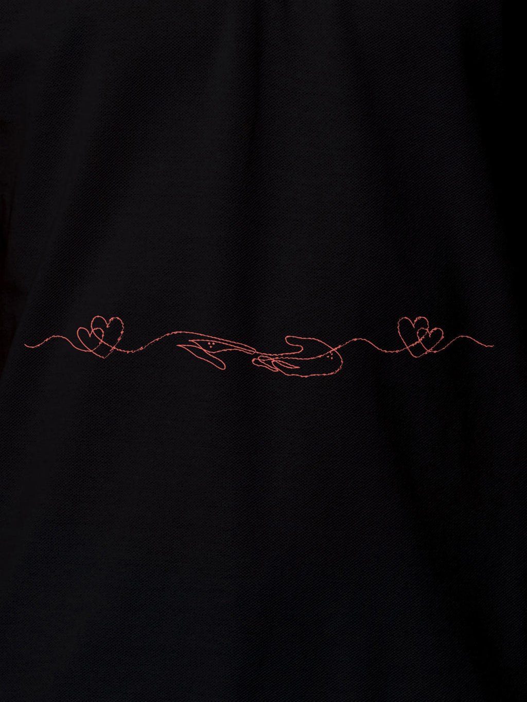 Close up of 'Empathy' design on Women's Black Polo T-shirt, highlighting intricate details and vibrant print.