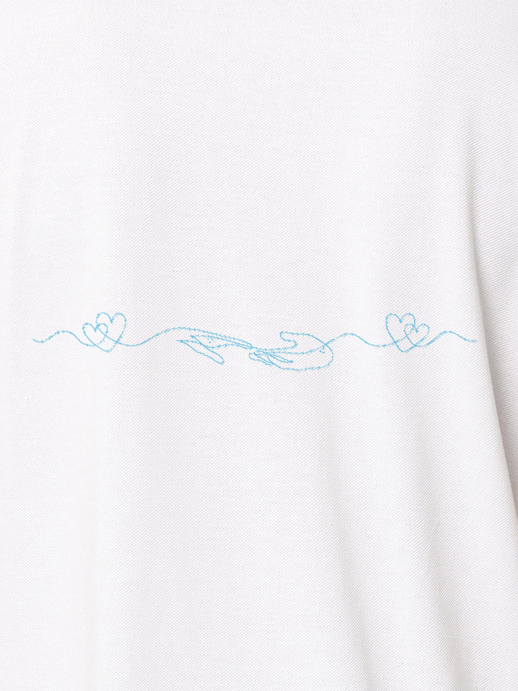 Close up of 'Empathy' design on Men's White Polo T-shirt, highlighting intricate details and vibrant print.