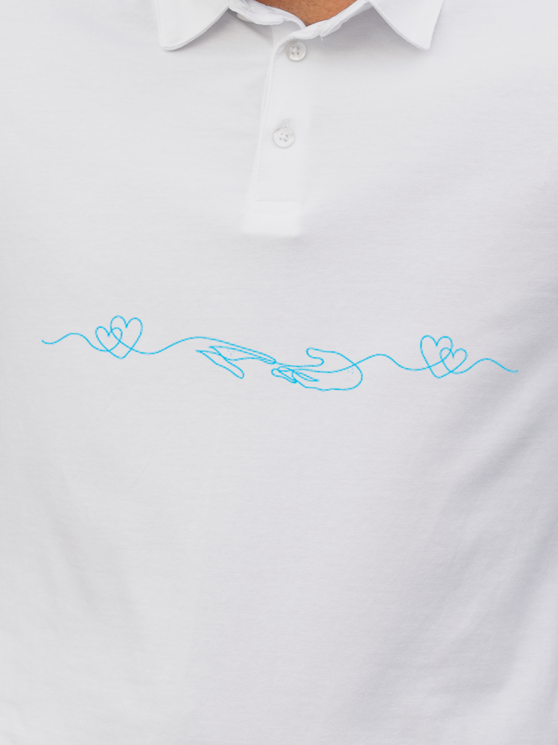 Close up of 'Empathy' design on Men's White Polo T-shirt, highlighting intricate details and vibrant print.