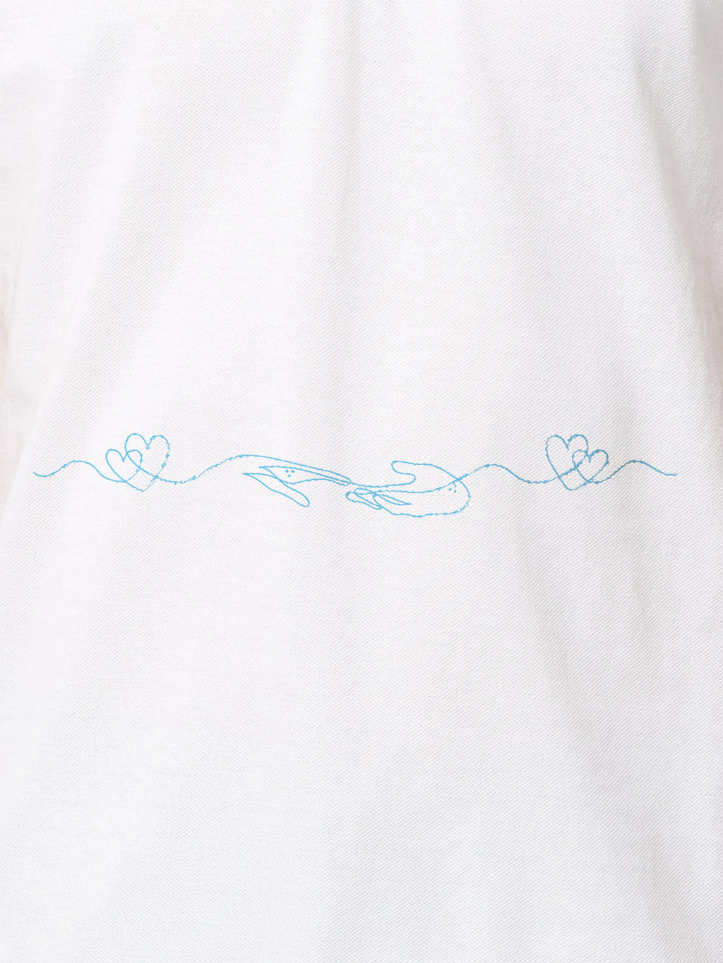 Close up of 'Empathy' design on Women's White Polo T-shirt, highlighting intricate details and vibrant print.