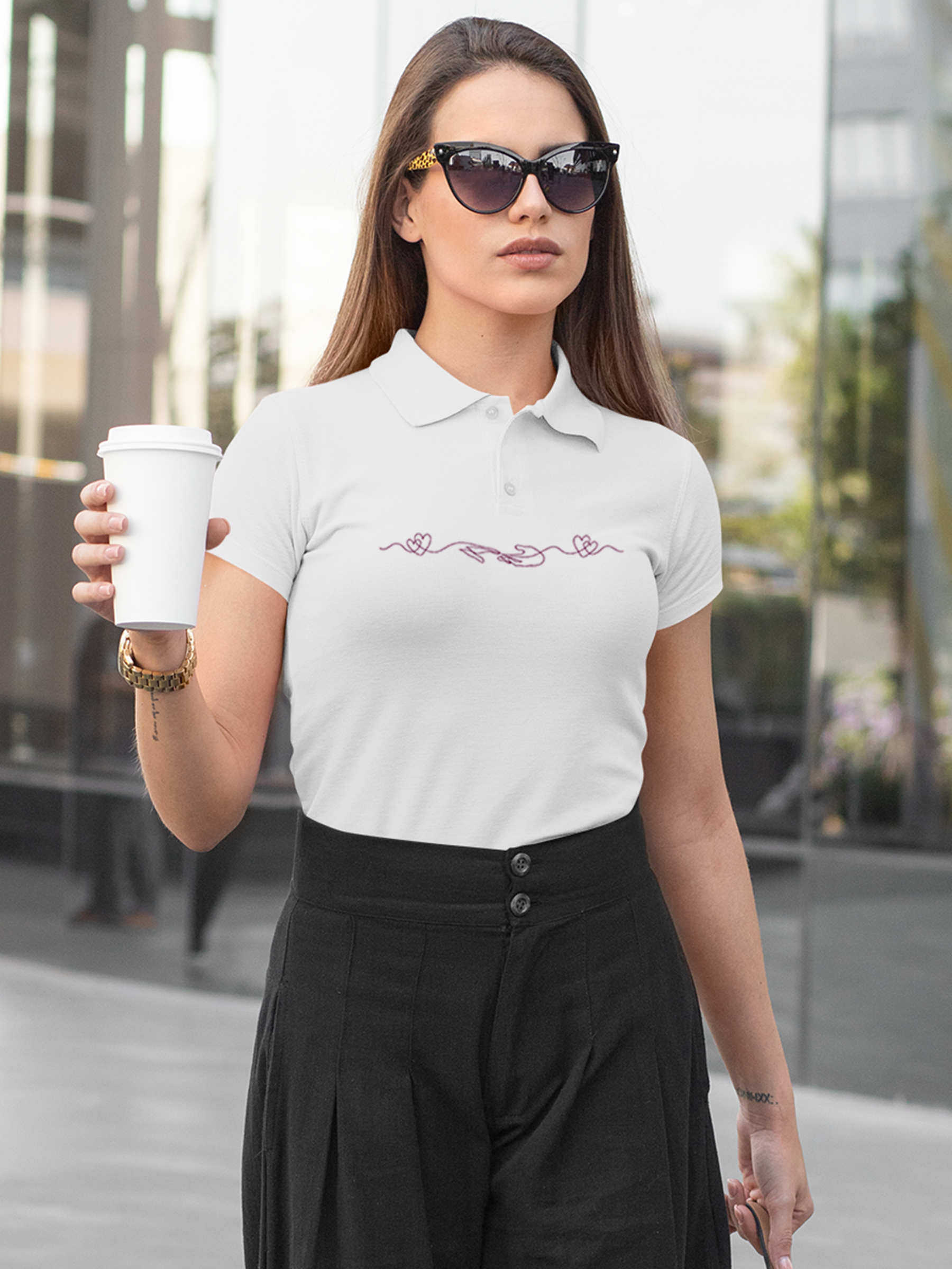 Model wearing Women's White Polo T-shirt with 'Empathy' design, offering effortless style and premium comfort