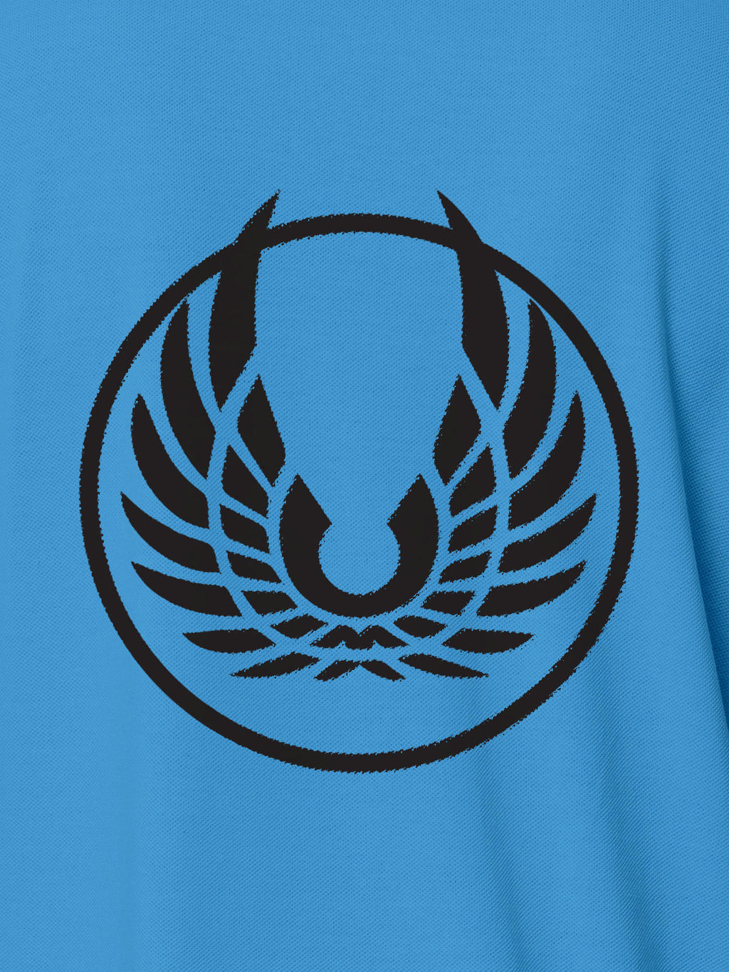 Close up of 'Free' design on Women's Blue Polo T-shirt, highlighting intricate details and vibrant print.