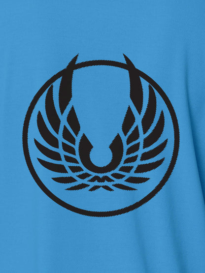 Close up of 'Free' design on Women's Blue Polo T-shirt, highlighting intricate details and vibrant print.