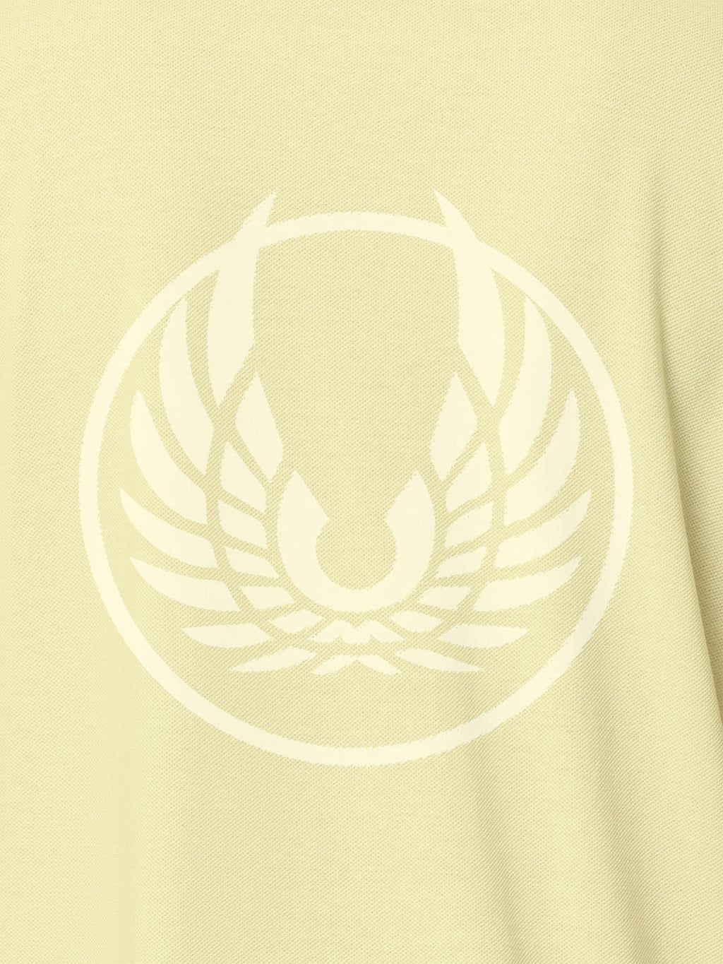 Close up of 'Free' design on Women's Yellow Polo T-shirt, highlighting intricate details and vibrant print.