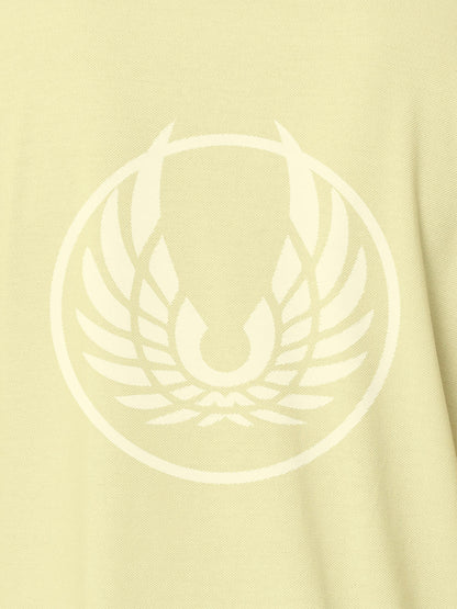 Close up of 'Free' design on Women's Yellow Polo T-shirt, highlighting intricate details and vibrant print.