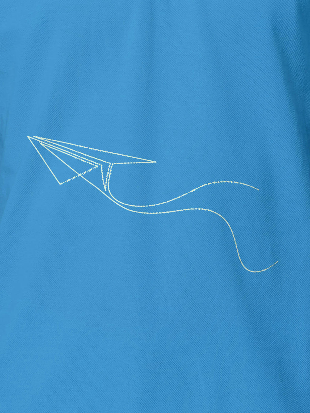 Close up of 'Empowered' design on Women's Blue Polo T-shirt, highlighting intricate details and vibrant print.
