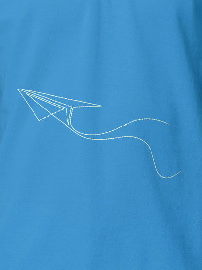 Close up of 'Empowered' design on Women's Blue Polo T-shirt, highlighting intricate details and vibrant print.