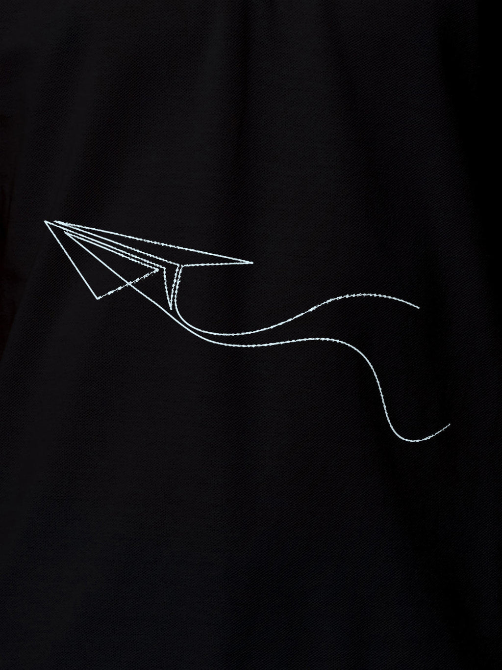 Close up of 'Empowered' design on Women's Black Polo T-shirt, highlighting intricate details and vibrant print.