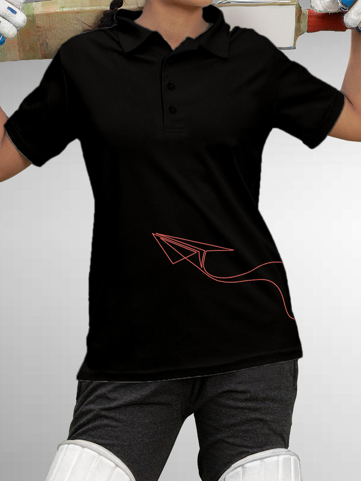Model wearing Women's Black Polo T-shirt with 'Empowered' design, offering effortless style and premium comfort