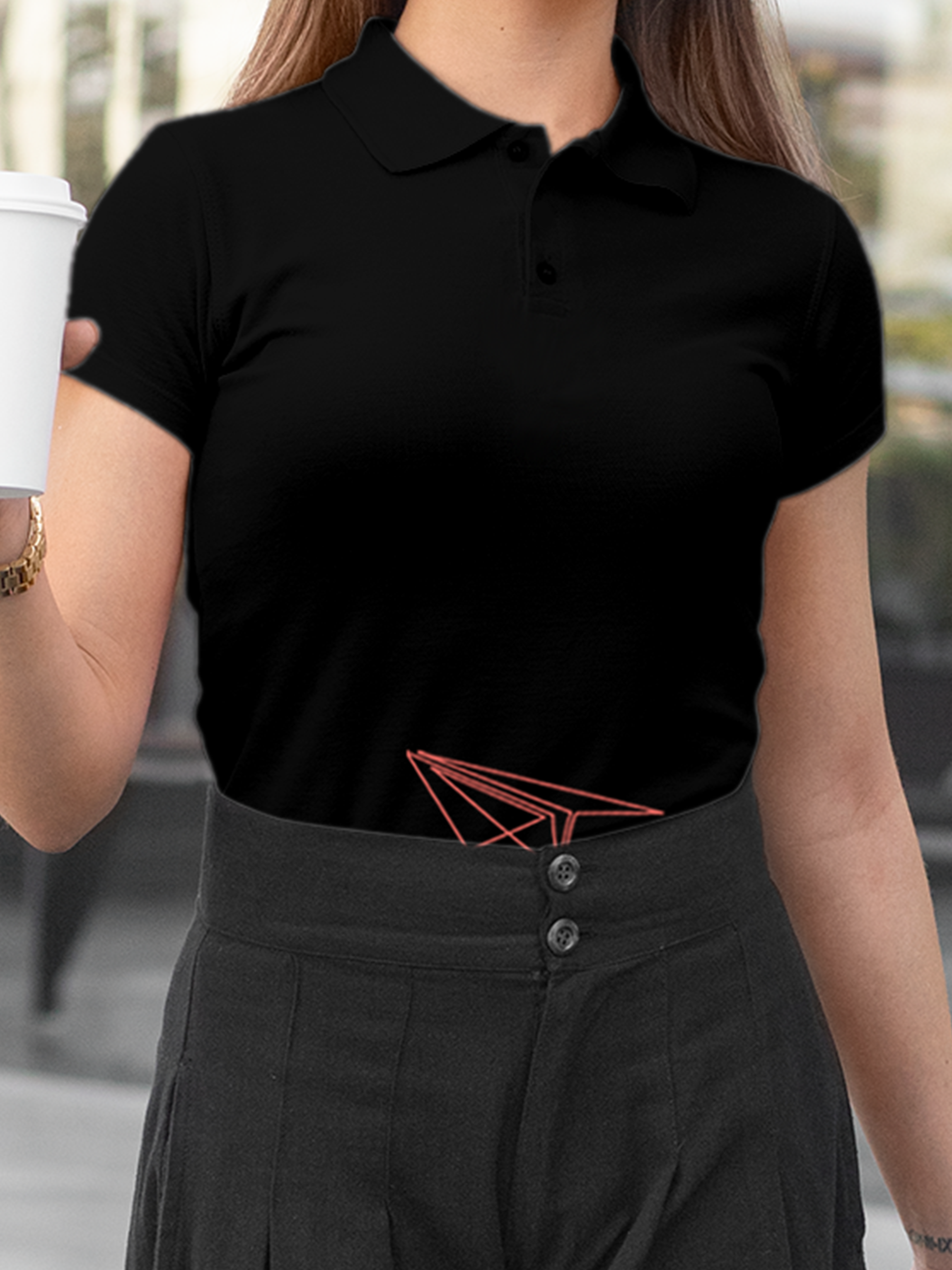 Close up of 'Empowered' design on Women's Black Polo T-shirt, highlighting intricate details and vibrant print.