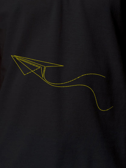 Close up of 'Empowered' design on Women's Dark Grey Polo T-shirt, highlighting intricate details and vibrant print.