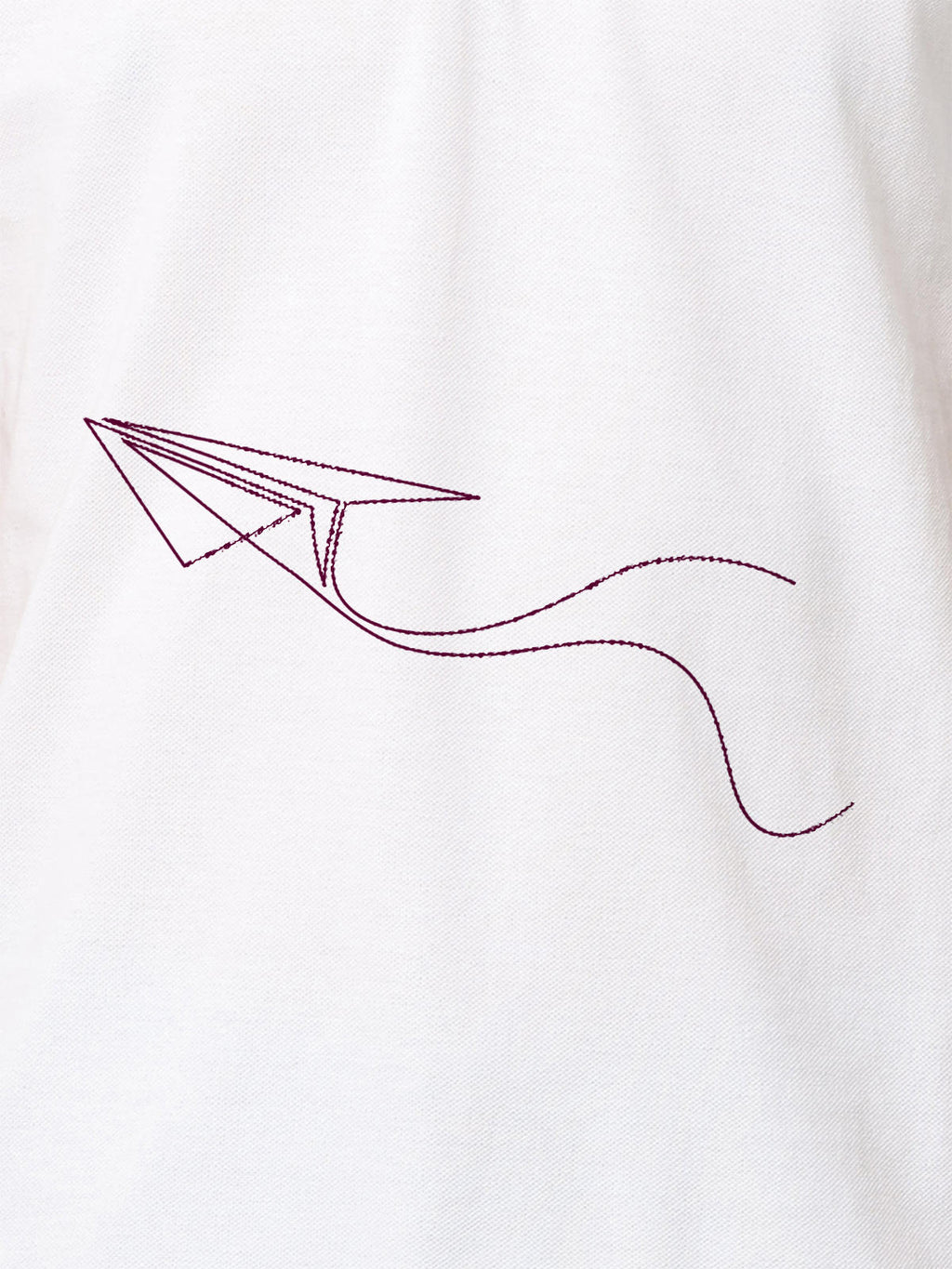 Close up of 'Empowered' design on Women's White Polo T-shirt, highlighting intricate details and vibrant print.