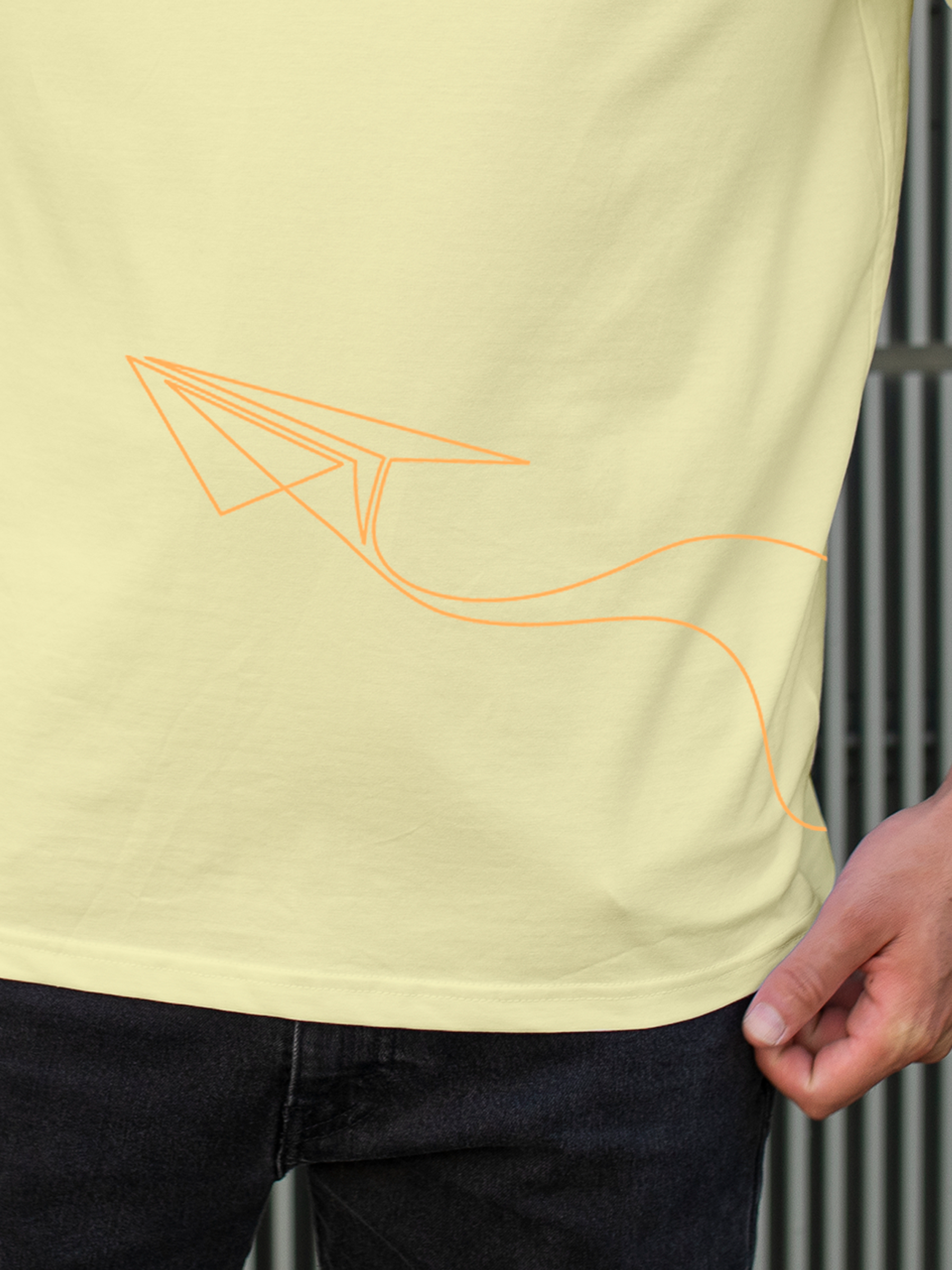 Close up of 'Empowered' design on Men's Yellow Polo T-shirt, highlighting intricate details and vibrant print.