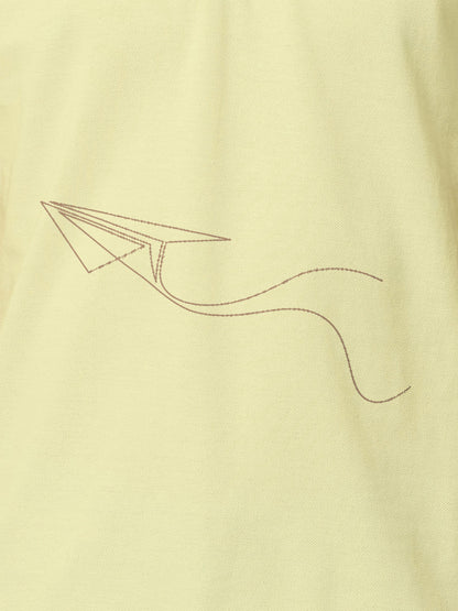 Close up of 'Empowered' design on Women's Yellow Polo T-shirt, highlighting intricate details and vibrant print.