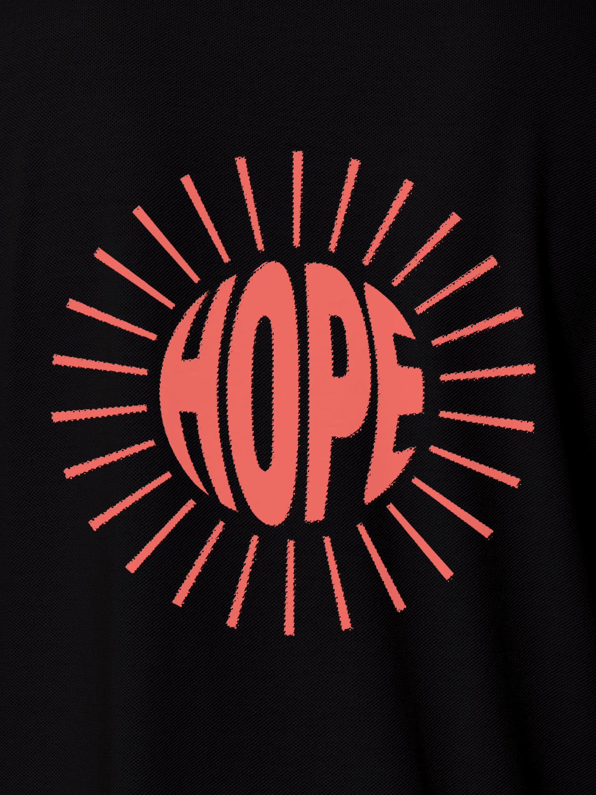 Close up of 'Hope' design on Women's Black Polo T-shirt, highlighting intricate details and vibrant print.