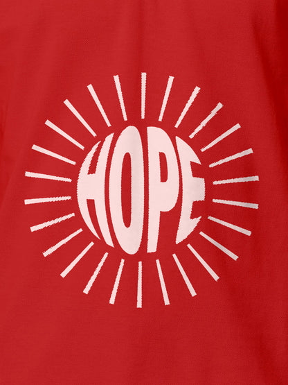 Close up of 'Hope' design on Men's Red Polo T-shirt, highlighting intricate details and vibrant print.