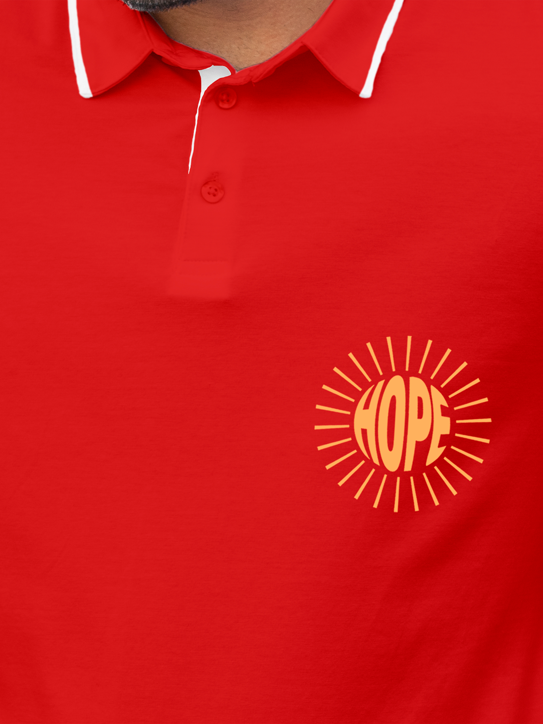 Close up of 'Hope' design on Men's Red Polo T-shirt, highlighting intricate details and vibrant print.