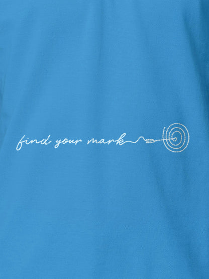 Close up of 'Find Your Mark' design on Men's Blue Polo T-shirt, highlighting intricate details and vibrant print.