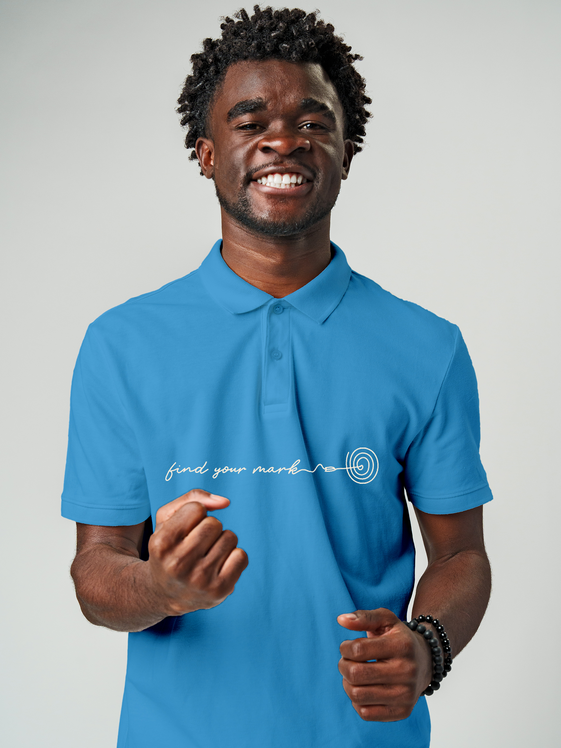 Model wearing Men's Blue Polo T-shirt with 'Find Your Mark' design, offering effortless style and premium comfort