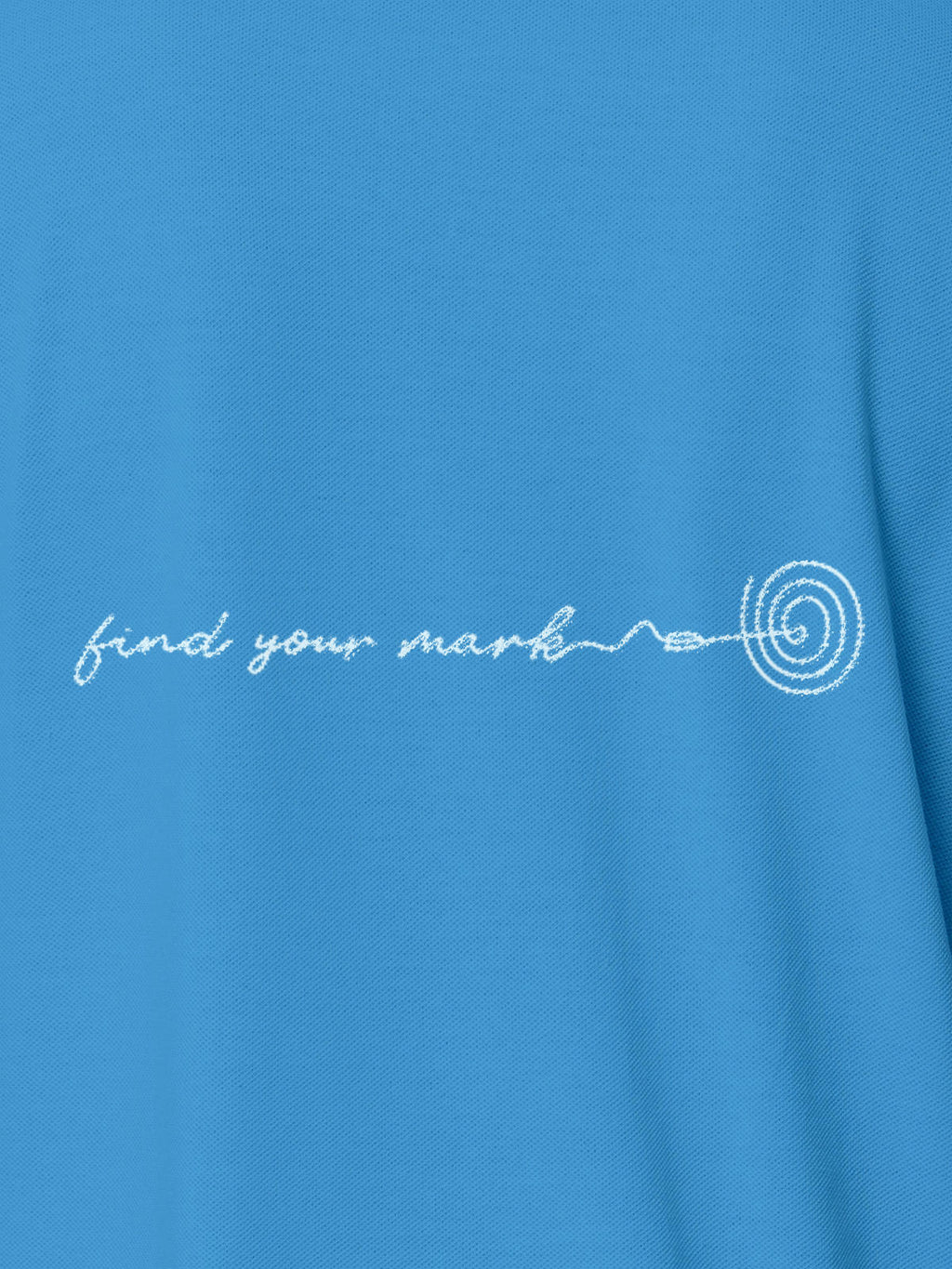 Close up of 'Find Your Mark' design on Women's Blue Polo T-shirt, highlighting intricate details and vibrant print.