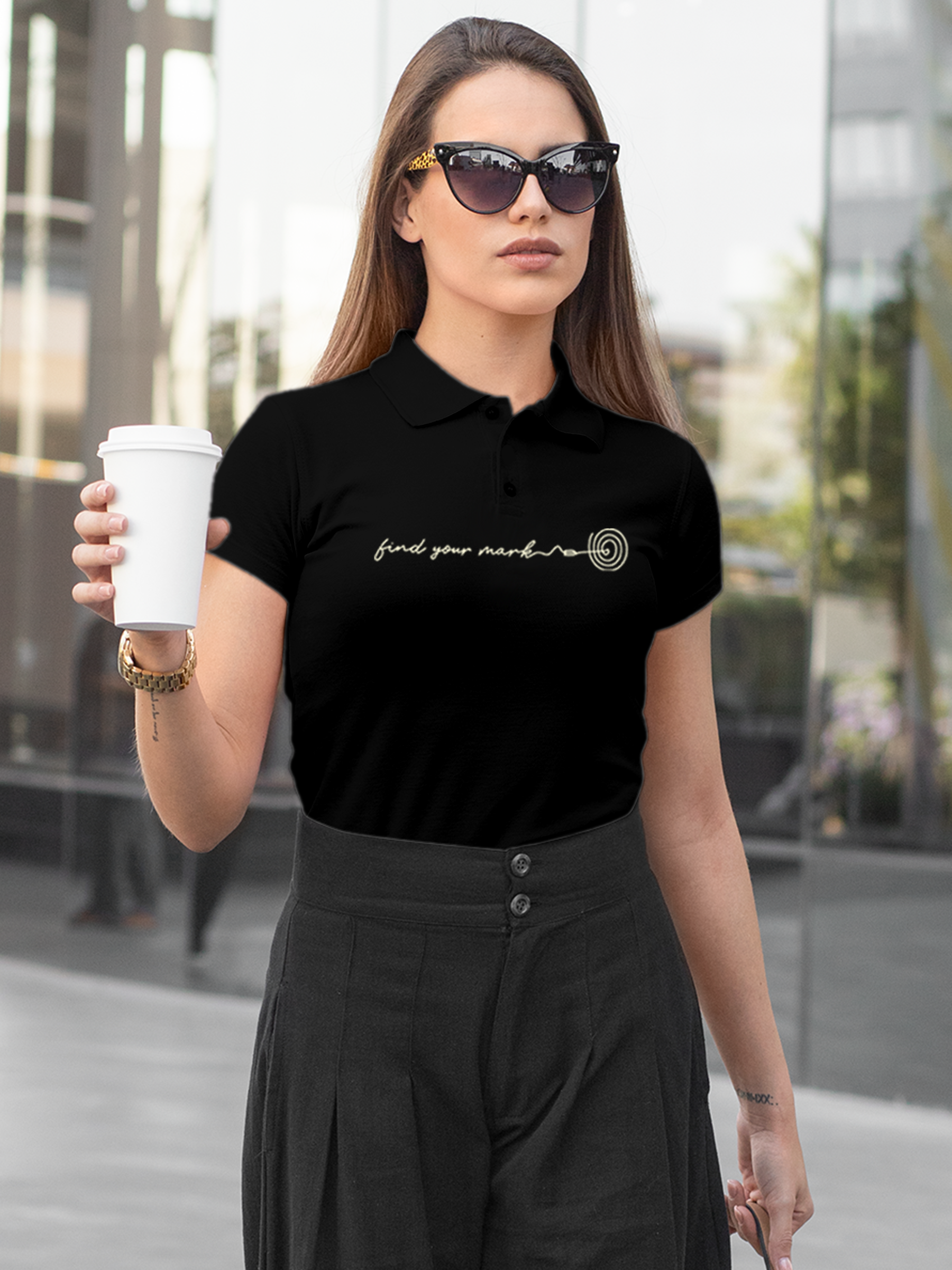 Model wearing Women's Black Polo T-shirt with 'Find Your Mark' design, offering effortless style and premium comfort