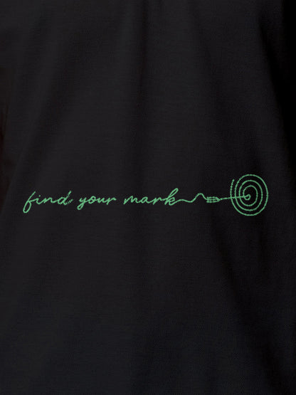 Close up of 'Find Your Mark' design on Men's Dark Grey Polo T-shirt, highlighting intricate details and vibrant print.