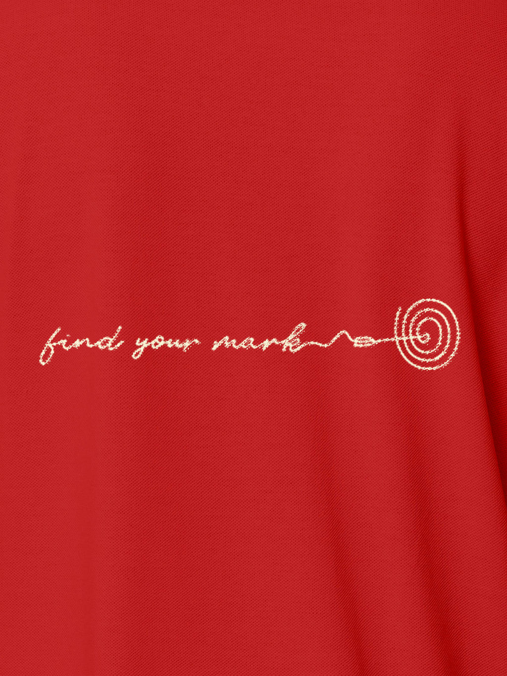 Close up of 'Find Your Mark' design on Women's Red Polo T-shirt, highlighting intricate details and vibrant print.