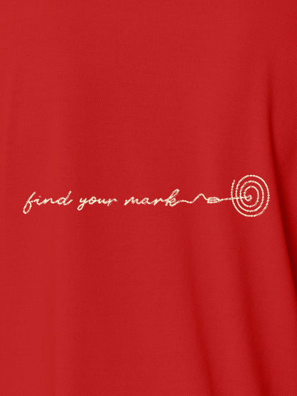 Close up of 'Find Your Mark' design on Women's Red Polo T-shirt, highlighting intricate details and vibrant print.