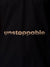 Close up of 'Unstoppable' design on Women's Black Polo T-shirt, highlighting intricate details and vibrant print.