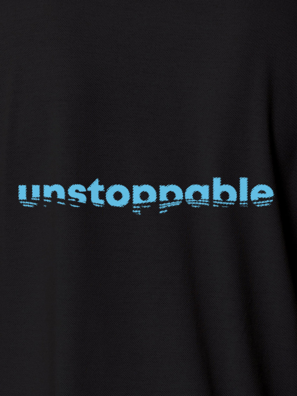 Close up of 'Unstoppable' design on Men's Dark Grey Polo T-shirt, highlighting intricate details and vibrant print.