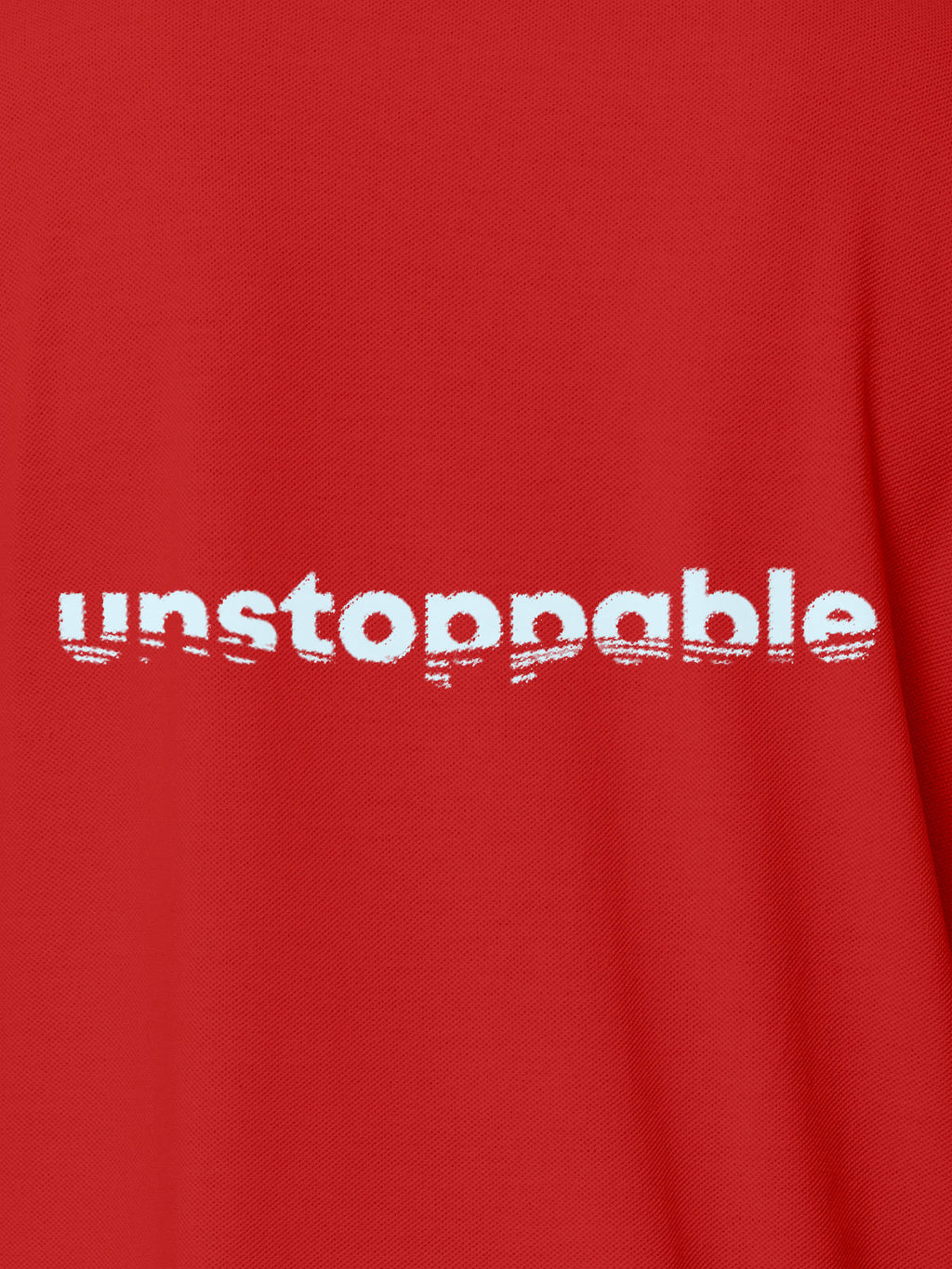 Close up of 'Unstoppable' design on Men's Red Polo T-shirt, highlighting intricate details and vibrant print.
