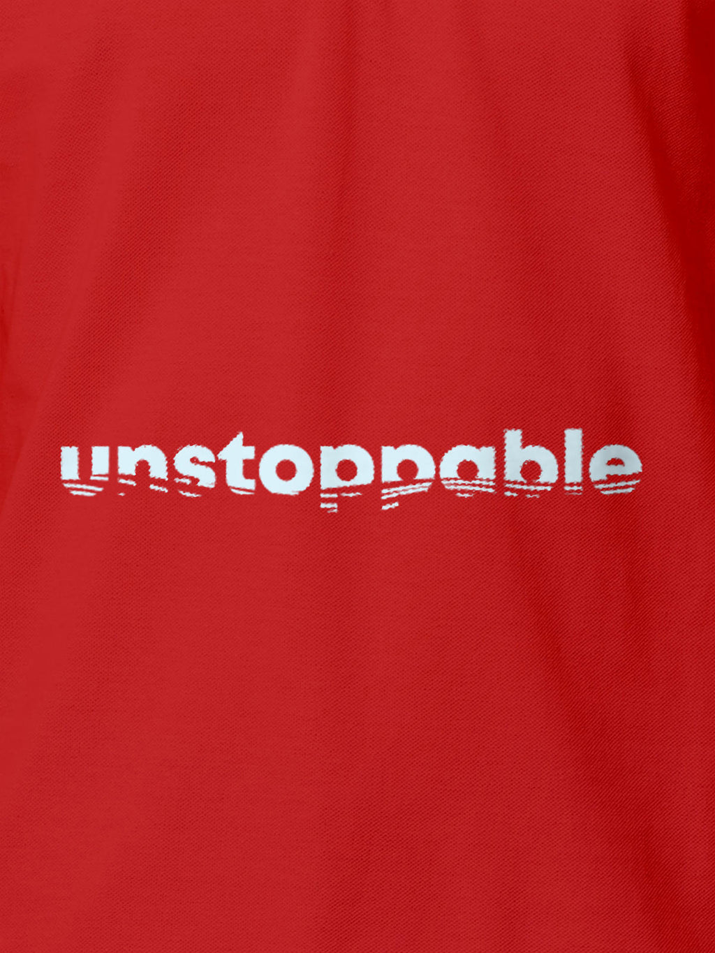 Close up of 'Unstoppable' design on Women's Red Polo T-shirt, highlighting intricate details and vibrant print.
