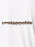 Close up of 'Unstoppable' design on Men's White Polo T-shirt, highlighting intricate details and vibrant print.