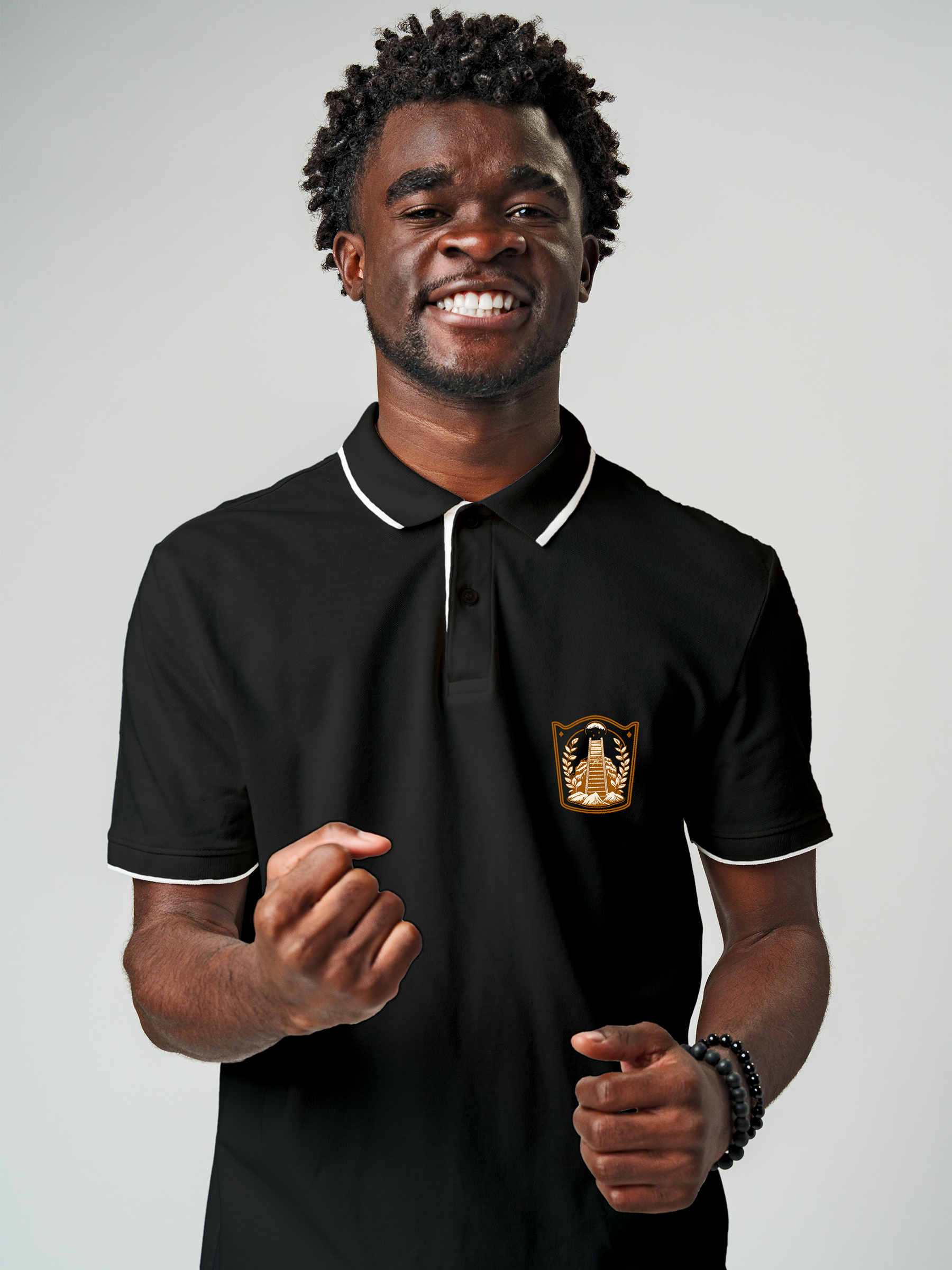 Model wearing Men's Charcoal Grey Polo T-shirt with 'Ambition' design, offering effortless style and premium comfort