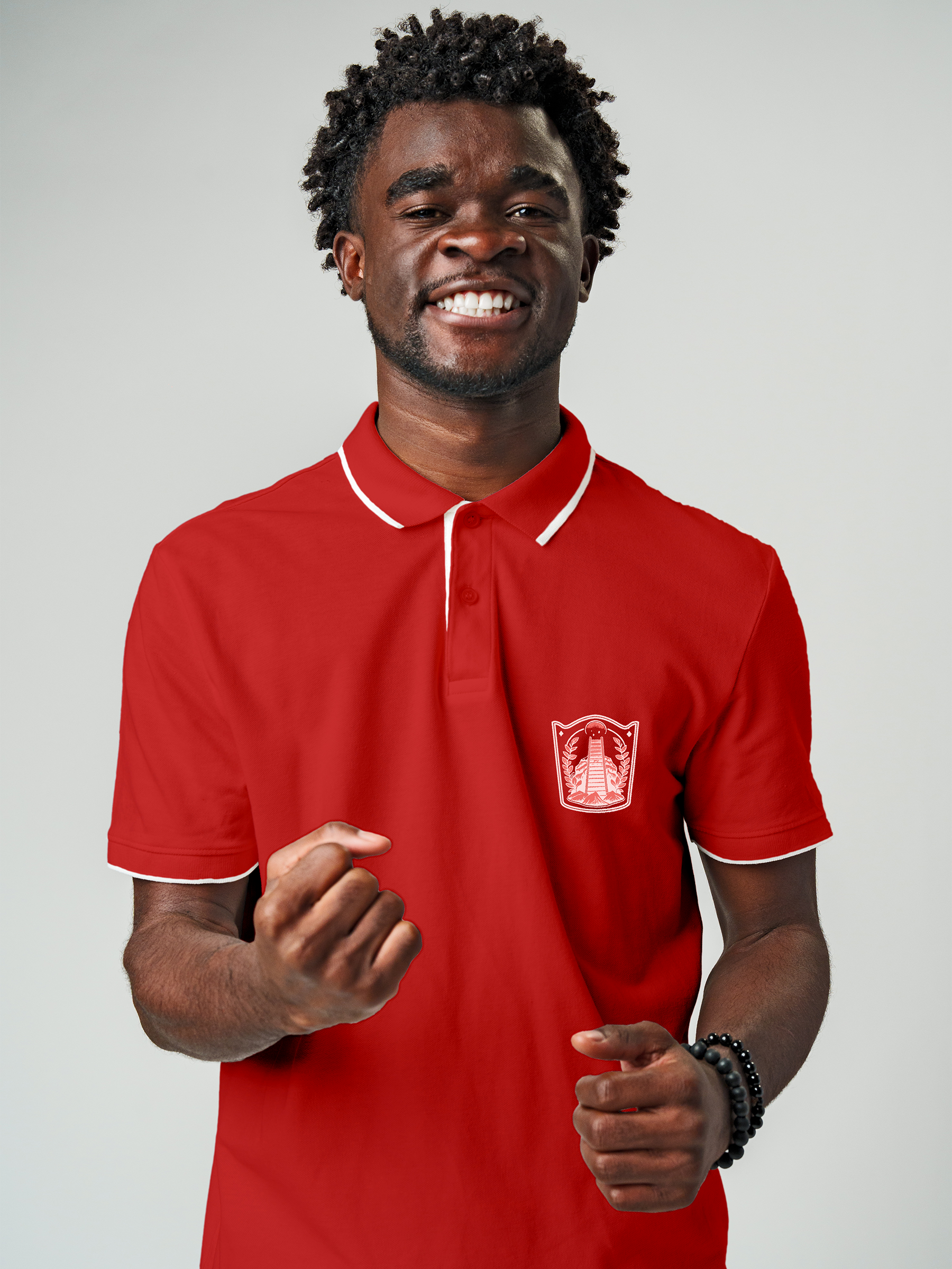 Model wearing Men's Red Polo T-shirt with 'Ambition' design, offering effortless style and premium comfort