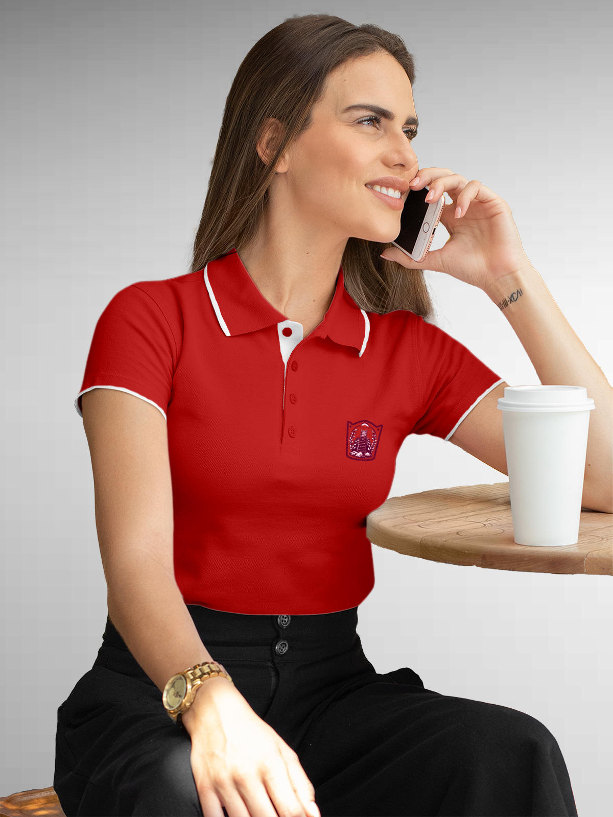 Model wearing Women's Red Polo T-shirt with 'Ambition' design, offering effortless style and premium comfort