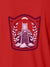 Close up of 'Ambition' design on Women's Red Polo T-shirt, highlighting intricate details and vibrant print.