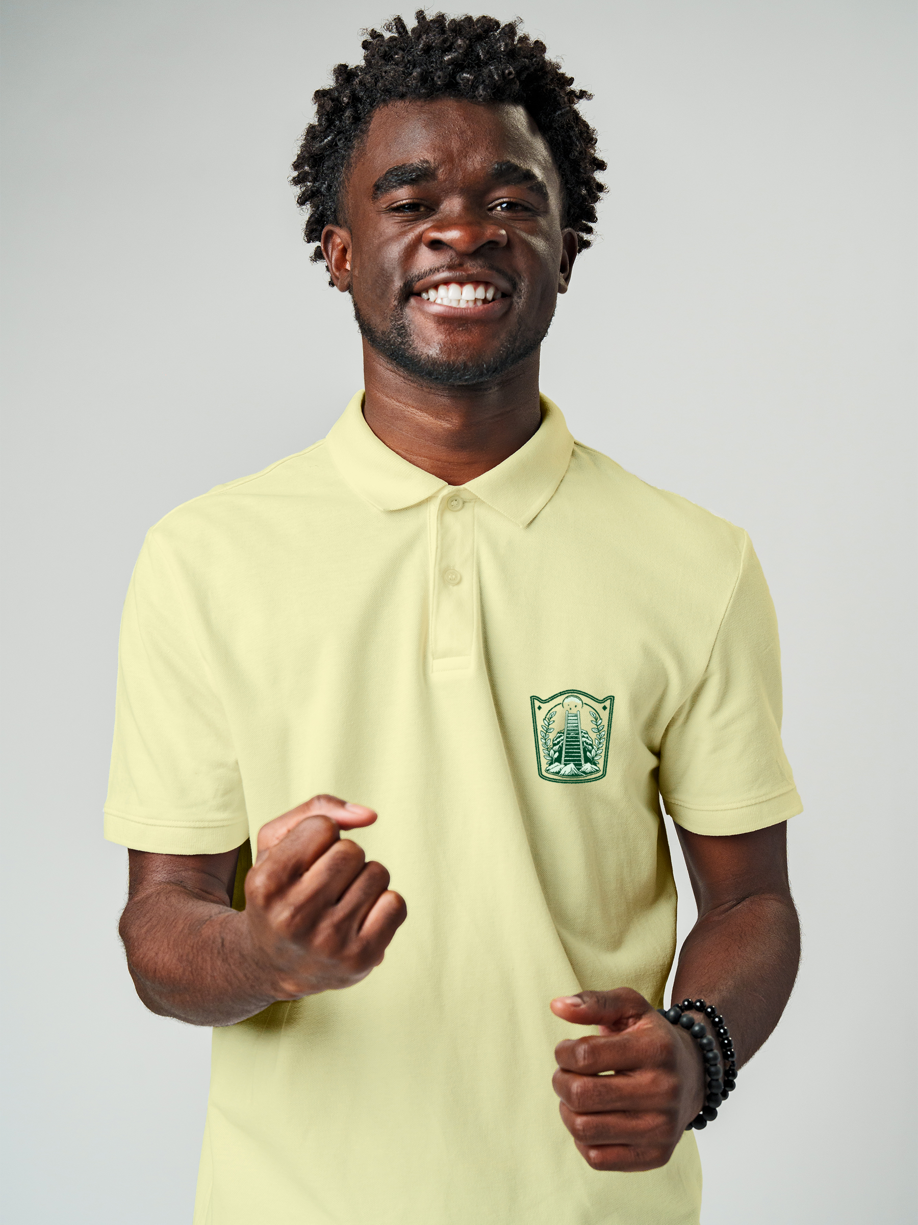 Model wearing Men's Yellow Polo T-shirt with 'Ambition' design, offering effortless style and premium comfort