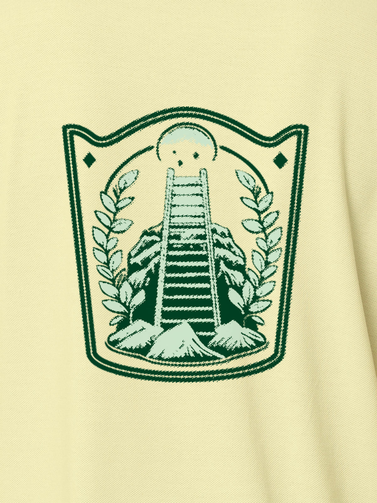 Close up of 'Ambition' design on Women's Yellow Polo T-shirt, highlighting intricate details and vibrant print.