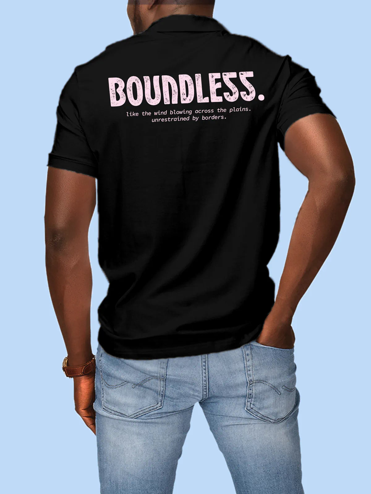 Model wearing Men's Black Collar T-shirt with a broken chain design on the chest and 'Boundless' text on the sleeve.