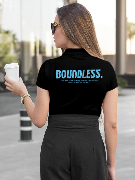 Fighterhero Polos: Model wearing Women's Black Polo T-shirt with 'Free & Boundless' design